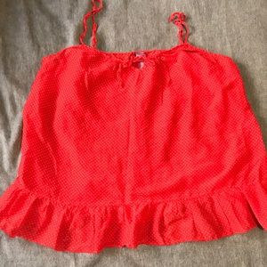 Red top with white polka dots